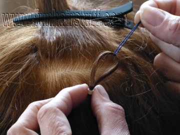 Fit a feather hair extension