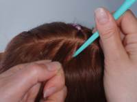 Select hair near the parting for your braid Select hair near the parting for your braid