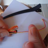 Pull the first two hairbraiding threads out Pull the first two hairbraiding threads out